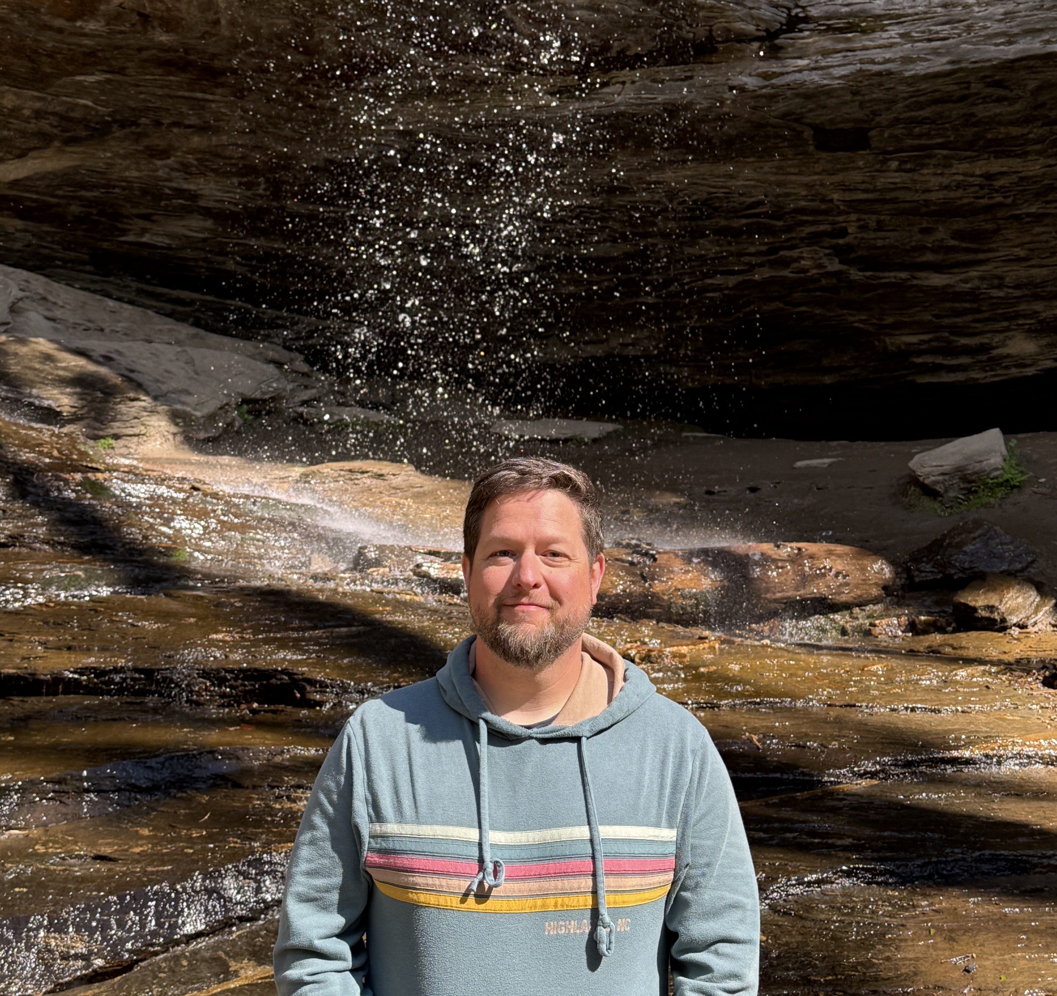In front of the waterfall at Moore's Cove in Pisgah National Forest